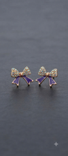 EdumartPlus Fusion Earring Combo Offer (Pack of 2 Pairs) – Bohemian Oxidized Silver Triangular Drop Jhumkas & Playful Purple Rhinestone Bow Studs